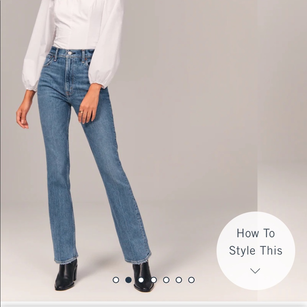 Worm 2 times. Ultra High Rise Vintage Flare Jeans in medium wash. 26L
